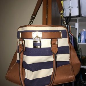 Blue and white striped purse